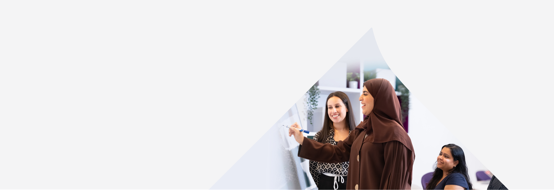 Al Ghurair employees collaborating to build careers and drive future progress